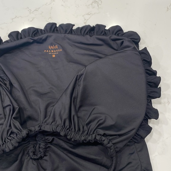 Palmacea, one piece, tied swimsuit with cut outs.  
Size M - Picture 6 of 12